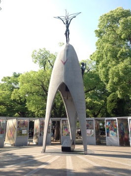 The entrance to the Peace Park where a large statue depicting Sadako (from the famous Japanese folk tale) holding a paper crane above her shoulders.